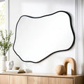 Miroir mural noir à silhouette asymétrique large
