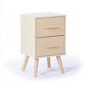 Table de chevet crème et beige à deux tiroirs et pieds effilés