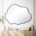 Miroir mural noir à forme de galet irrégulier