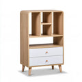 Bibliothèque beige et blanche à niches asymétriques et deux tiroirs